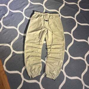 Tan Essentials Fear Of God Joggers